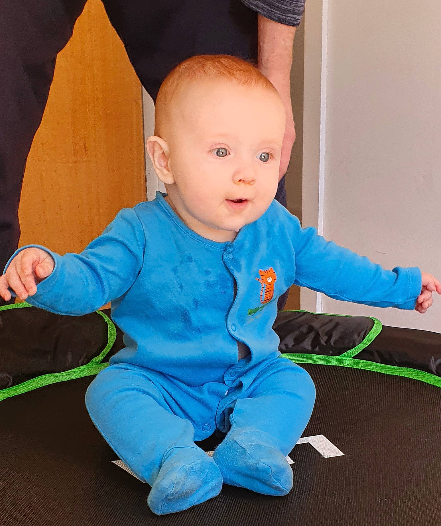 Aleksander is registered to the contest to win money with this photo: azure, baby_toddler_clothing, cheek, eye, face, facial_expression, finger, floor, hairstyle, happy, head, human_body, joint, leg, person, product, shoulder, skin, sleeve, surprise