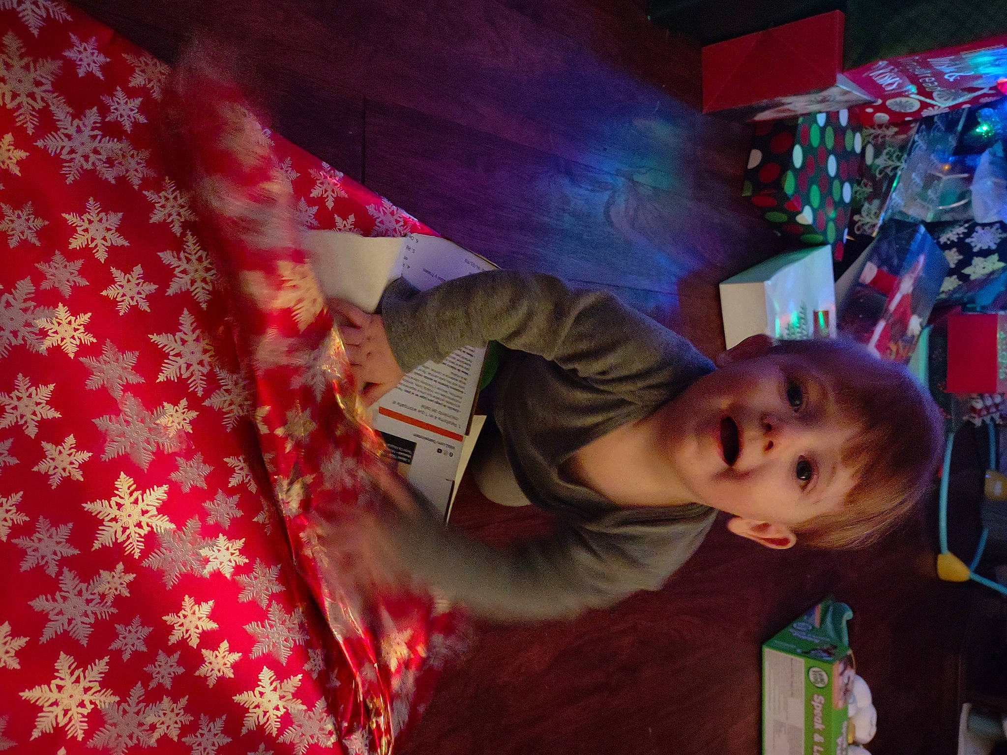 Noah is registered to the contest to win money with this photo: child, event, flesh, fun, happy, leisure, linens, magenta, party, pattern, peach, person, pink, play, red, room, smile, surprise, textile, toddler