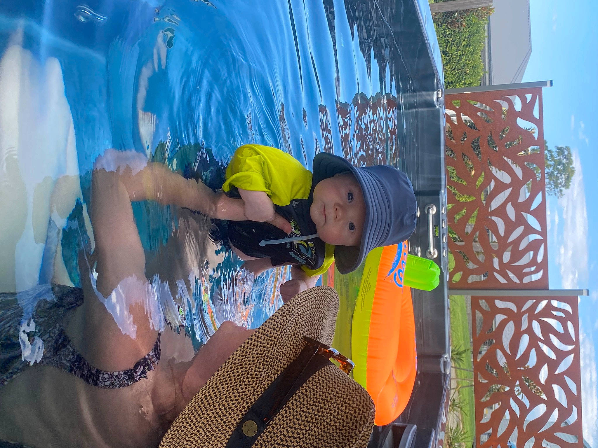 Henry is registered to the contest to win money with this photo: baseball_cap, cap, child, event, fun, hat, headwear, jewellery, leisure, mural, necklace, pattern, person, play, public_event, recreation, sun_hat, t_shirt, tourism, vacation