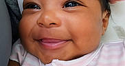 Aureliana joined the competition — help win amazing prizes! apparel, baby, cheeks, child, close_up, cute, eyebrows, eyes, face, hand, happy, infant, mouth, newborn, person, pink, portrait, skin, smile, striped_clothing