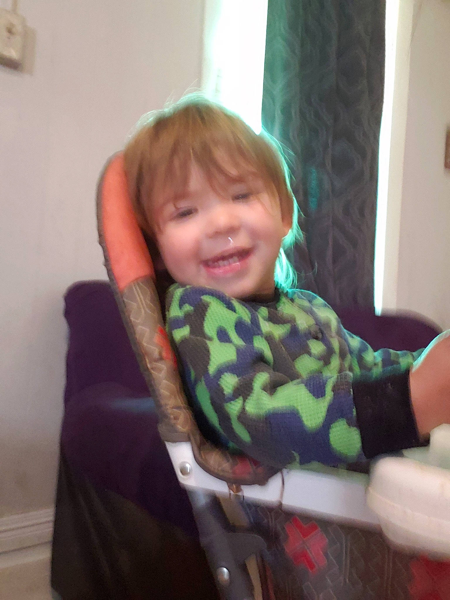 Robert Jr joined the competition — help win amazing prizes! baby_toddler_clothing, chair, cheek, child, comfort, curtain, elbow, human_body, iris, joy, lap, leg, neck, person, shoulder, sitting, sleeve, smile, t_shirt, thumb