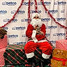 background, beard, bench, cat, christmas, costume, decorations, festive, fur_costume, gift_box, gingerbread_plush, green, holiday, indoor, person, petco_logo, plaid, red, santa_claus, tinsel