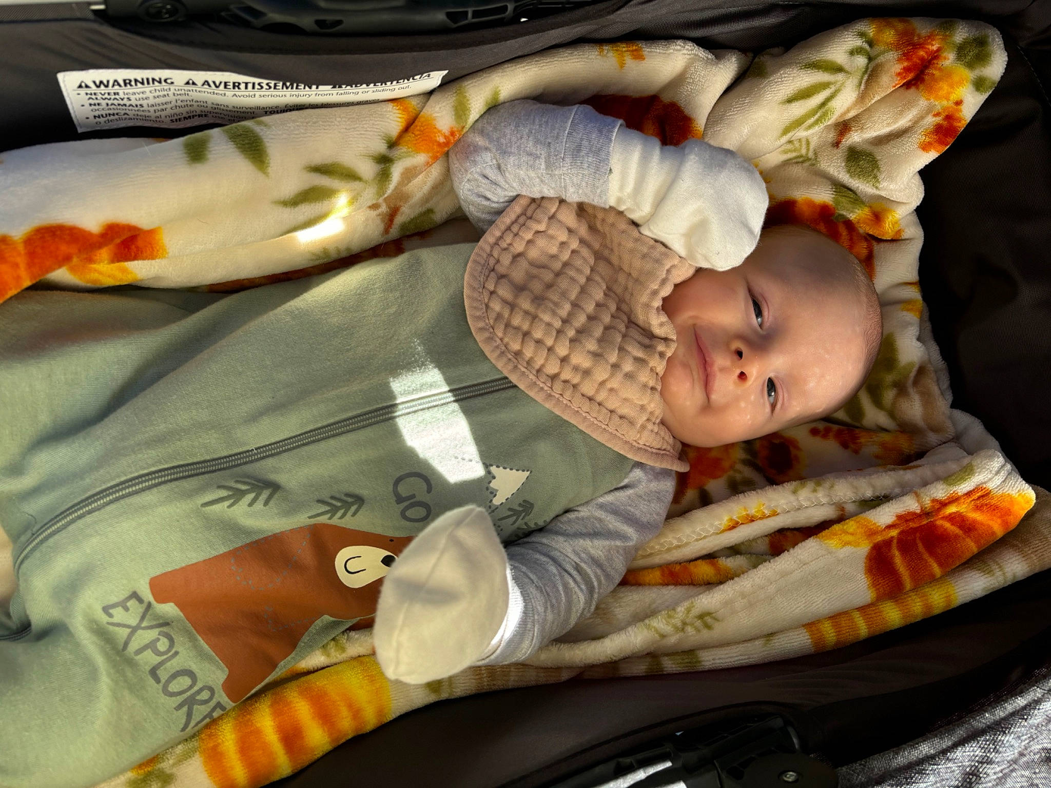 Aaron is registered to the contest to win money with this photo: auto_part, automotive_lighting, baby, baby_carriage, baby_in_car_seat, baby_products, car_seat, child, comfort, lap, linens, luxury_vehicle, nap, orange, person, sitting, sleep, smile, toddler, trunk