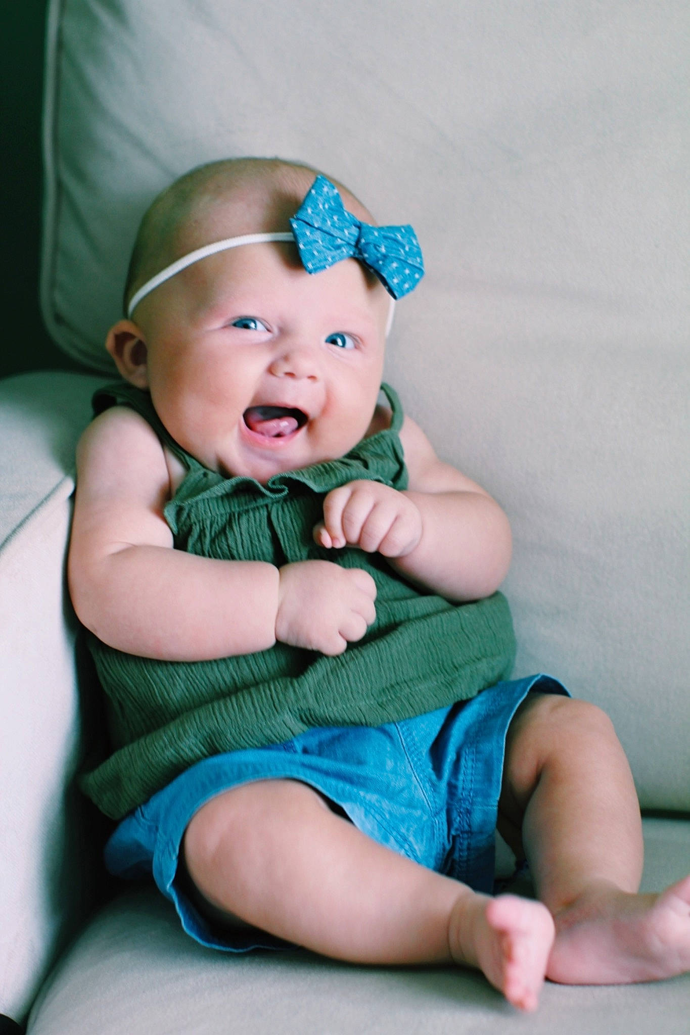 Kaiya is registered to the contest to win money with this photo: baby, baby_toddler_clothing, blue, cheek, child, child_model, fashion_accessory, hair_accessory, hand, headband, headgear, leg, person, photo_shoot, photography, sitting, skin, sleeve, smile, toddler