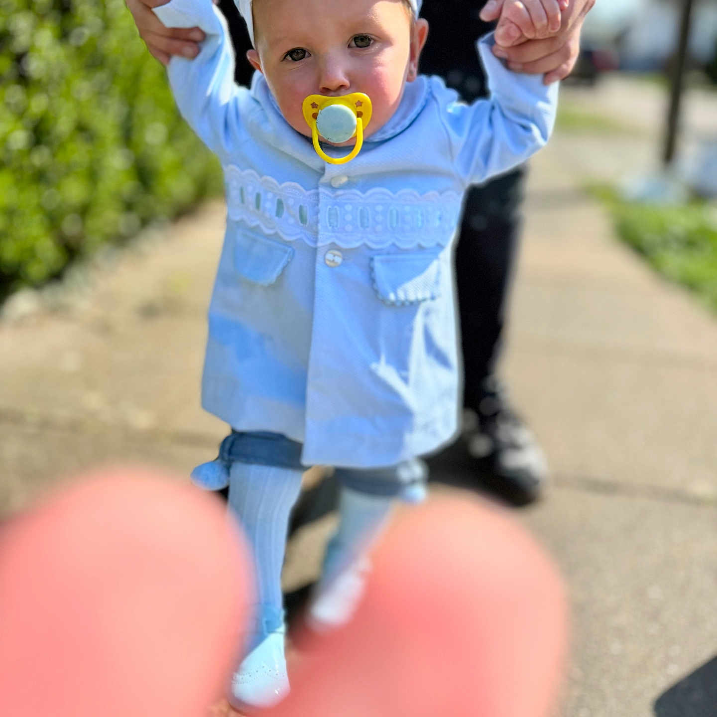 Hugo-Blû is registered to the contest to win money with this photo: baby, baseballcap, bodypart, bonnet, cap, clothing, coat, face, finger, footwear, hand, hat, head, jacket, longsleeve, person, photography, portrait, shoe, sleeve