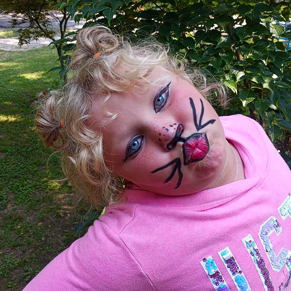 Everlynn is registered to the contest to win money with this photo: brown_hair, child, chin, eye, eyebrow, eyelash, eyewear, face, grass, happy, head, leisure, lip, magenta, neck, people_in_nature, person, pink, plant, skin