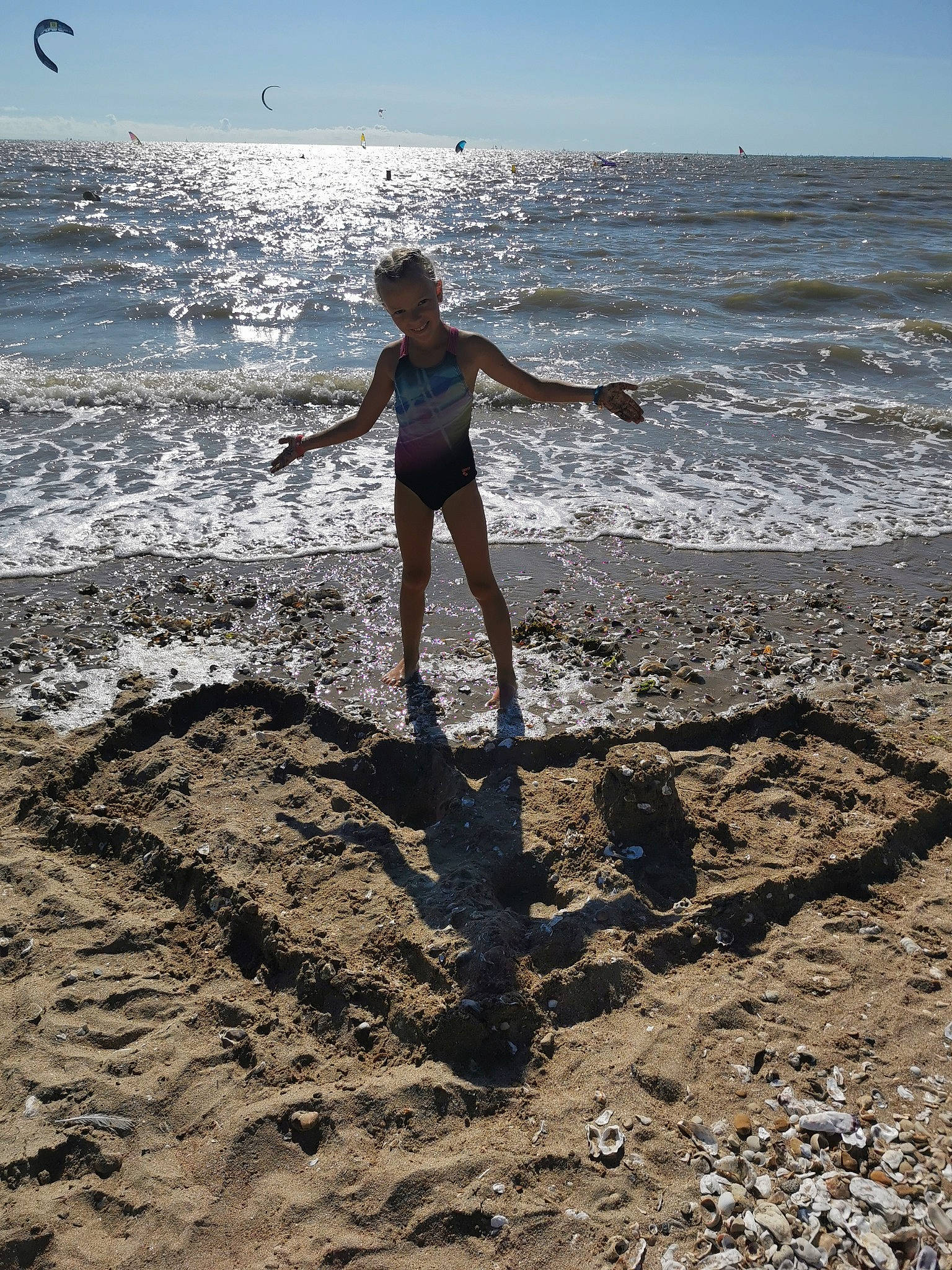 Jonell participe au concours pour gagner de l'argent avec cette photo : beach, body_of_water, fun, happy, horizon, human_leg, joy, leisure, ocean, people_in_nature, people_on_beach, person, recreation, shore, sky, soil, summer, thigh, water, wind
