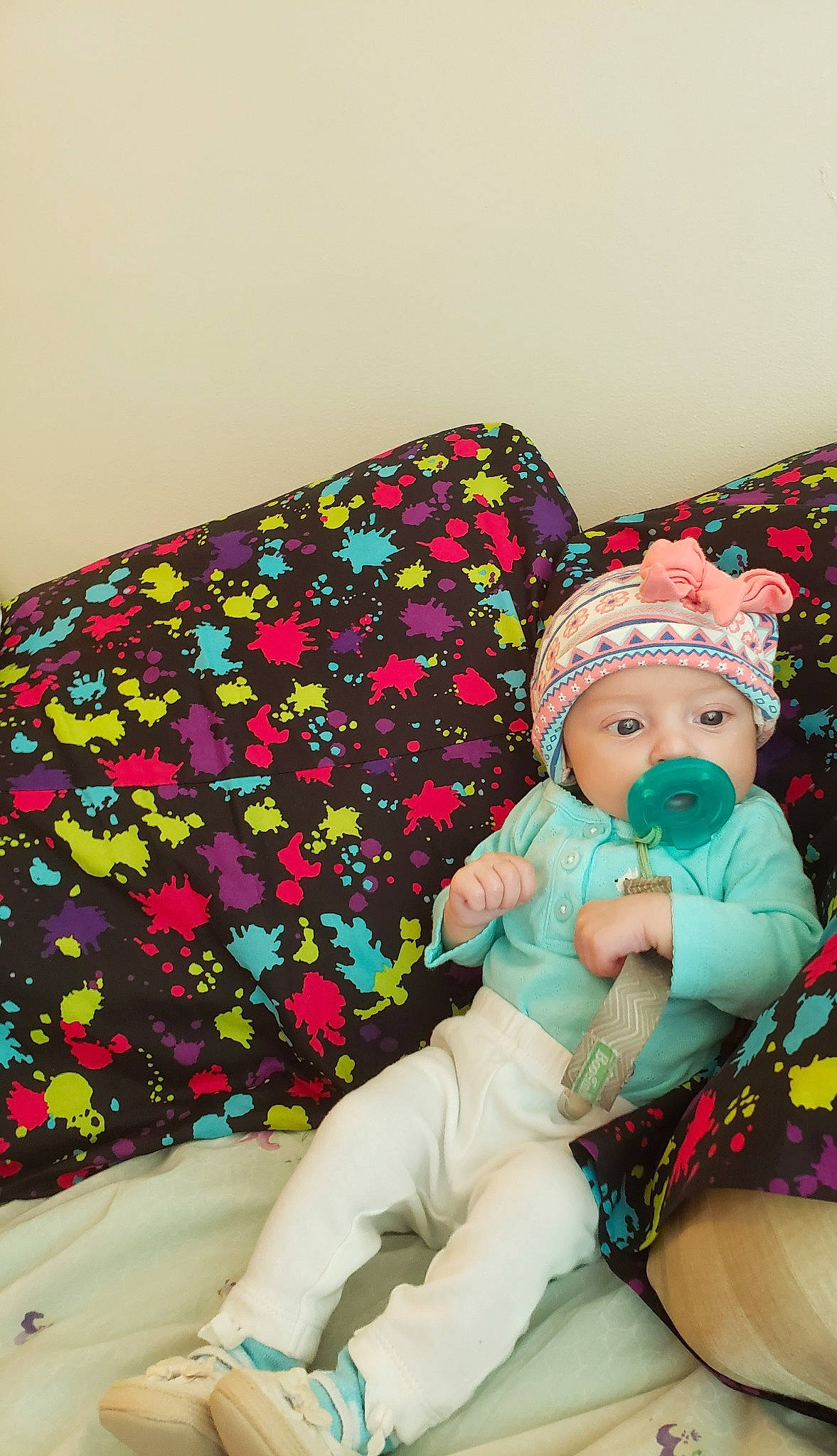 Sophia joined the competition — help win amazing prizes! baby, baby_products, baby_sleeping, baby_toddler_clothing, child, comfort, doll, event, fashion_accessory, hat, headwear, lap, linens, magenta, pattern, person, pink, sitting, sleeve, stuffed_toy