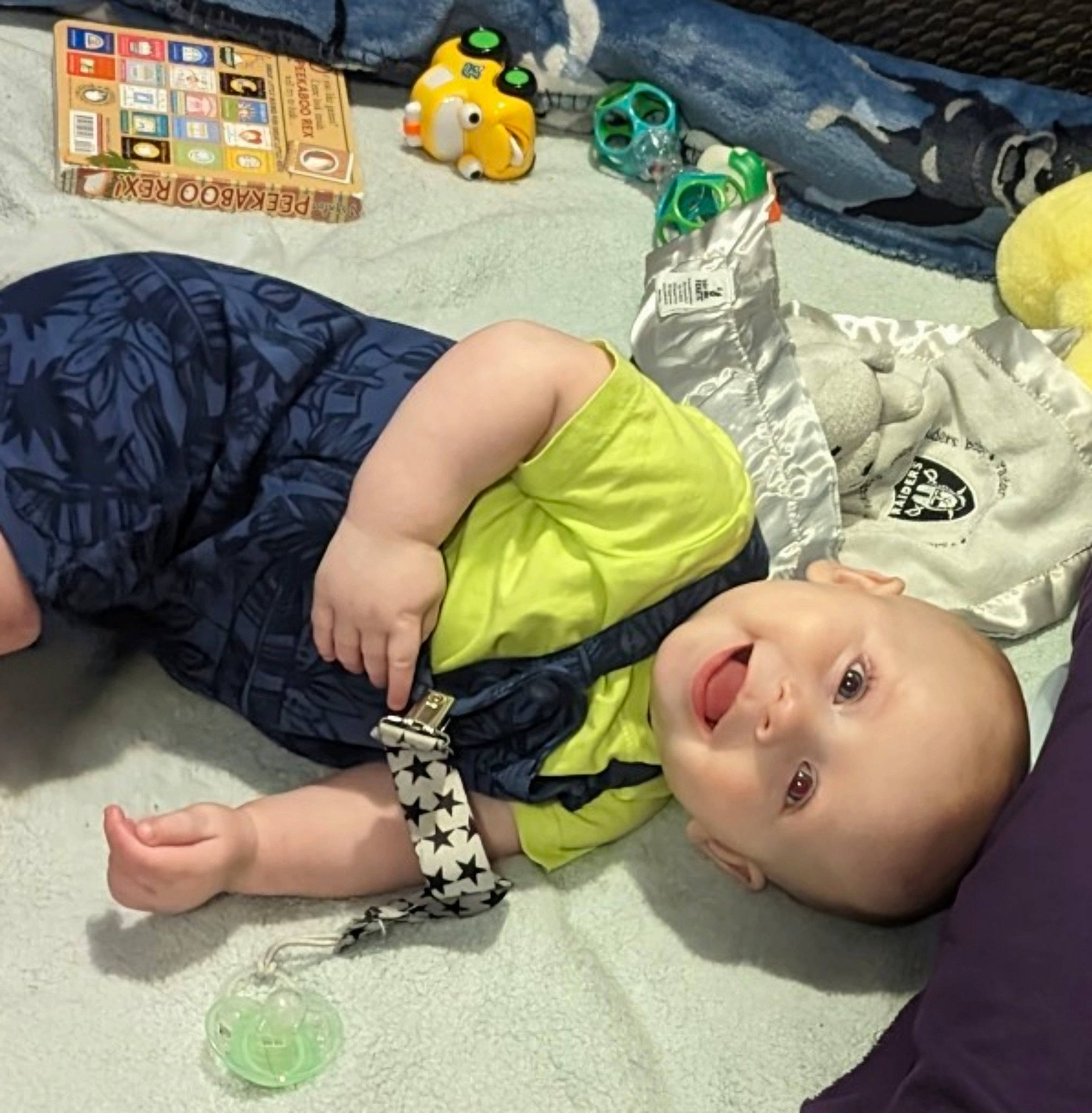 Ashtyn joined the competition — help win amazing prizes! baby, baby_toddler_clothing, child, comfort, cool, flooring, foot, fun, grass, happy, human_leg, joy, knee, pattern, person, sitting, sleeve, smile, t_shirt, thigh