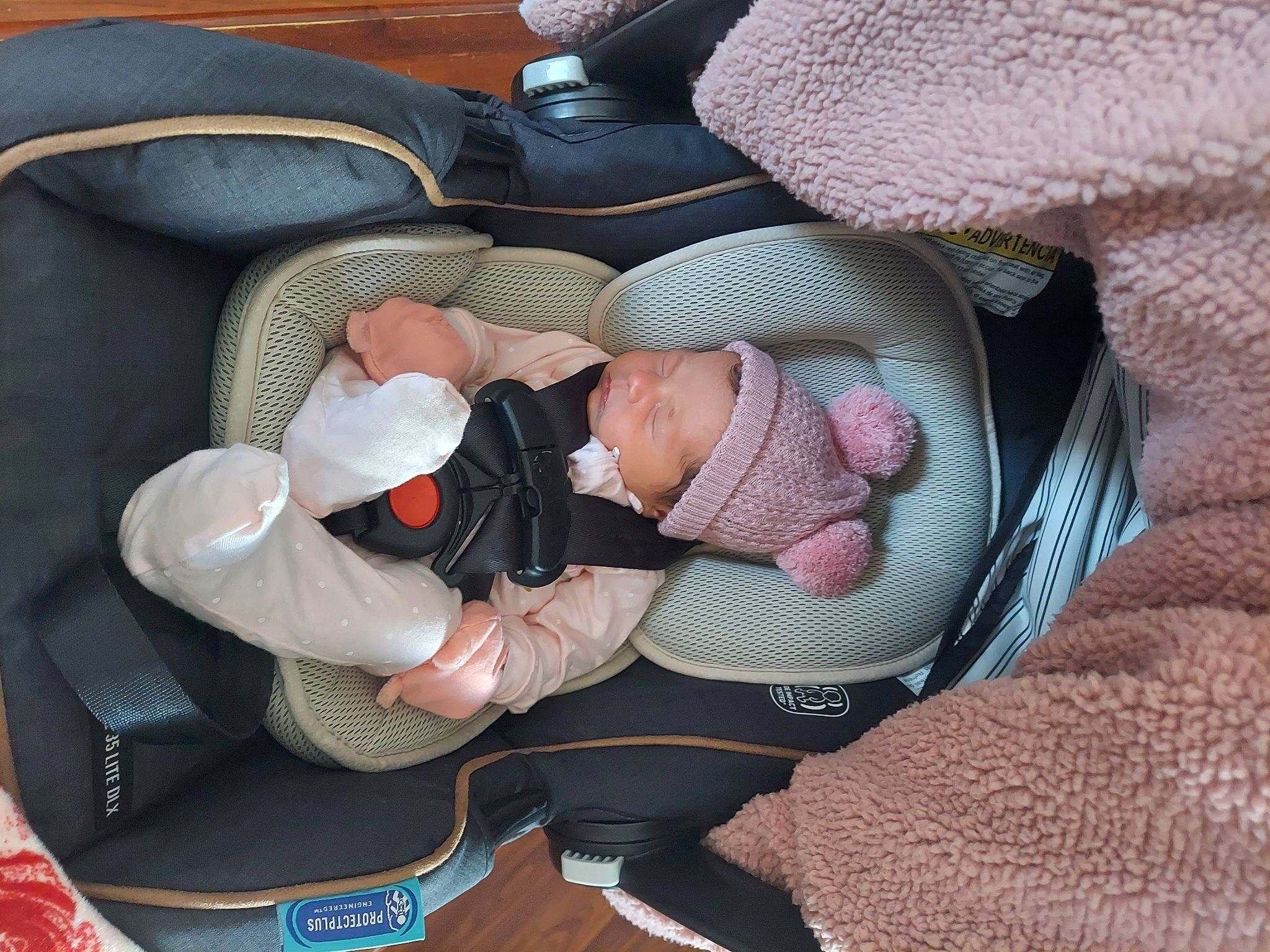 Dana is registered to the contest to win money with this photo: baby, baby_carriage, baby_in_car_seat, baby_products, baby_sleeping, baby_toddler_clothing, car_seat, carmine, child, comfort, head, human_body, infant_bed, lap, nap, person, sock, thigh, toddler, travel_pillow