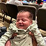 Mariana joined the competition — help win amazing prizes! baby, infant, smiling, closed_eyes, holding_hands, auditorium, people, chairs, stage, background_blur, clothing, cute, portrait, seated, indoor, event, crowd, soft_lighting, happy, tiny_fingers
