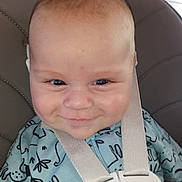 Weston joined the competition — help win amazing prizes! baby, child, car_seat, safety_harness, blue_clothing, smile, face, infant, cute, portrait, indoors, straps, young_child, happy, seat, closeup, expression, person, baby_clothes, seatbelt