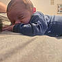 Asher joined the competition — help win amazing prizes! baby, blue_onesie, blurred_background, child, closeup, cozy, cute, face, head, homedecor, indoor, infant, palm_tree_pattern, peaceful, person, portrait, resting, sleeping, small_hand, soft_surface