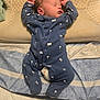 baby, bed, blanket, blue_clothing, child, cozy, cute, indoors, infant, newborn, onesie, palm_tree_pattern, peaceful, person, pillow, resting, sleep, sleeping, soft_lighting, van_pattern