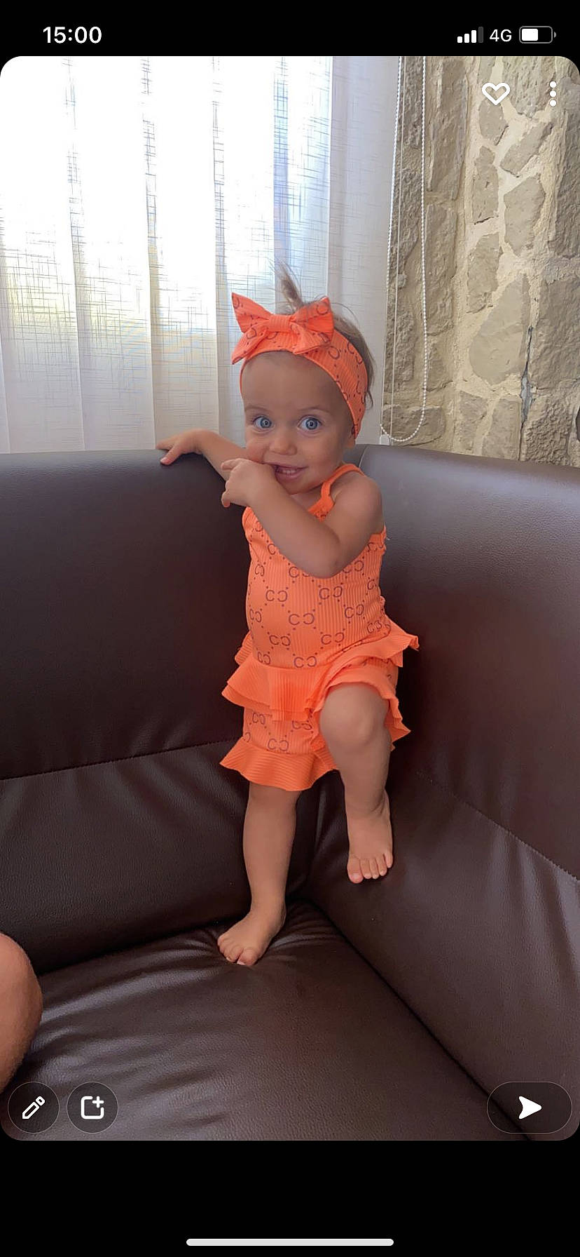 Chelsea participe au concours pour gagner de l'argent avec cette photo : arm, baby_toddler_clothing, comfort, couch, dress, floor, flooring, hair, head, headwear, human_body, iris, lip, magenta, neck, orange, person, pink, shoulder, sleeve
