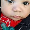 baby, closeup, face, pacifier, red_clothing, infant, cute, child, expression, portrait, young, skin, eyes, mouth, nose, head, baby_toy, adorable, childhood, innocence