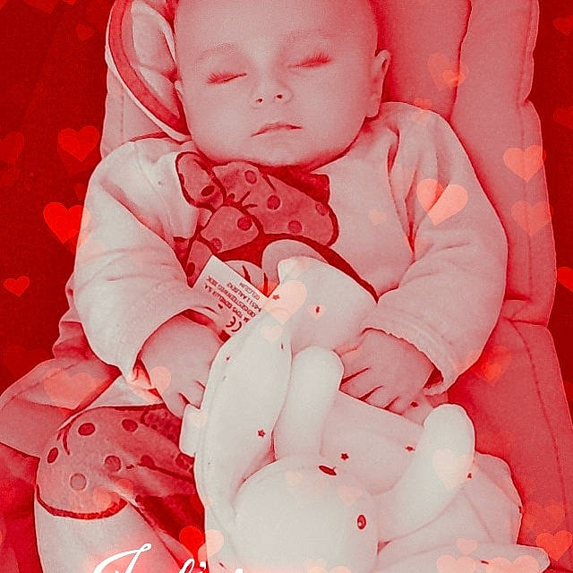 Peyton participe au concours pour gagner de l'argent avec cette photo : baby, baby_sleeping, baby_toddler_clothing, beauty, cheek, child, comfort, eye, finger, happy, lip, pattern, person, petal, pink, red, skin, sleeve, textile, toddler