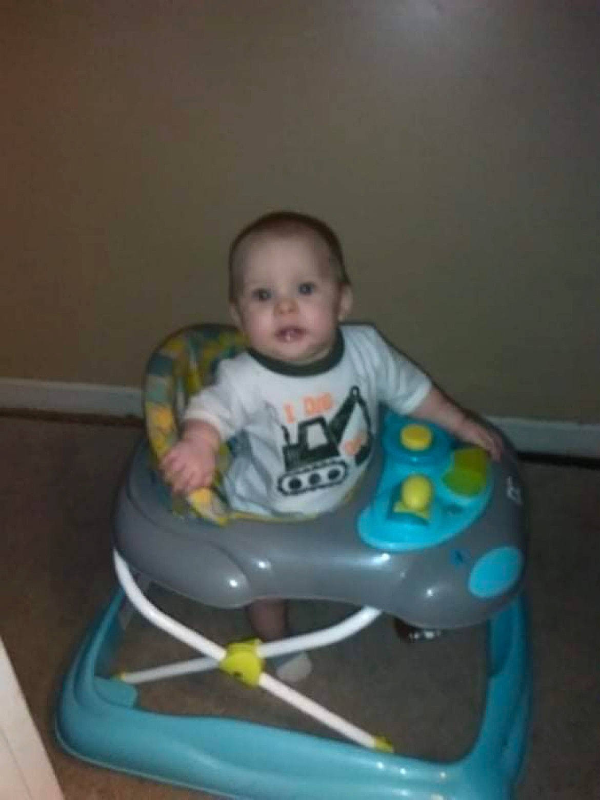 Drayden is registered to the contest to win money with this photo: baby, baby_products, baby_toddler_clothing, baby_toys, chair, child, cleanliness, comfort, electric_blue, fun, person, plastic, play, riding_toy, room, sitting, toddler