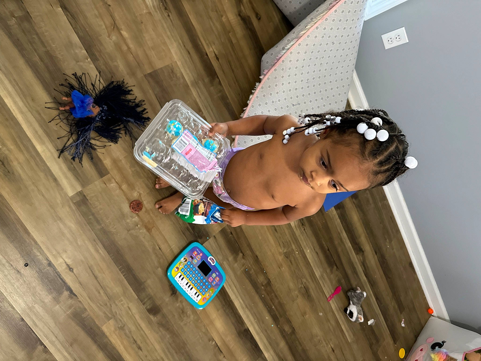Skylar is registered to the contest to win money with this photo: abdomen, chest, child, elbow, flooring, fun, happy, hardwood, human_leg, laminate_flooring, leisure, navel, person, thigh, toddler, trunk, waist, wood, wood_flooring, wood_stain