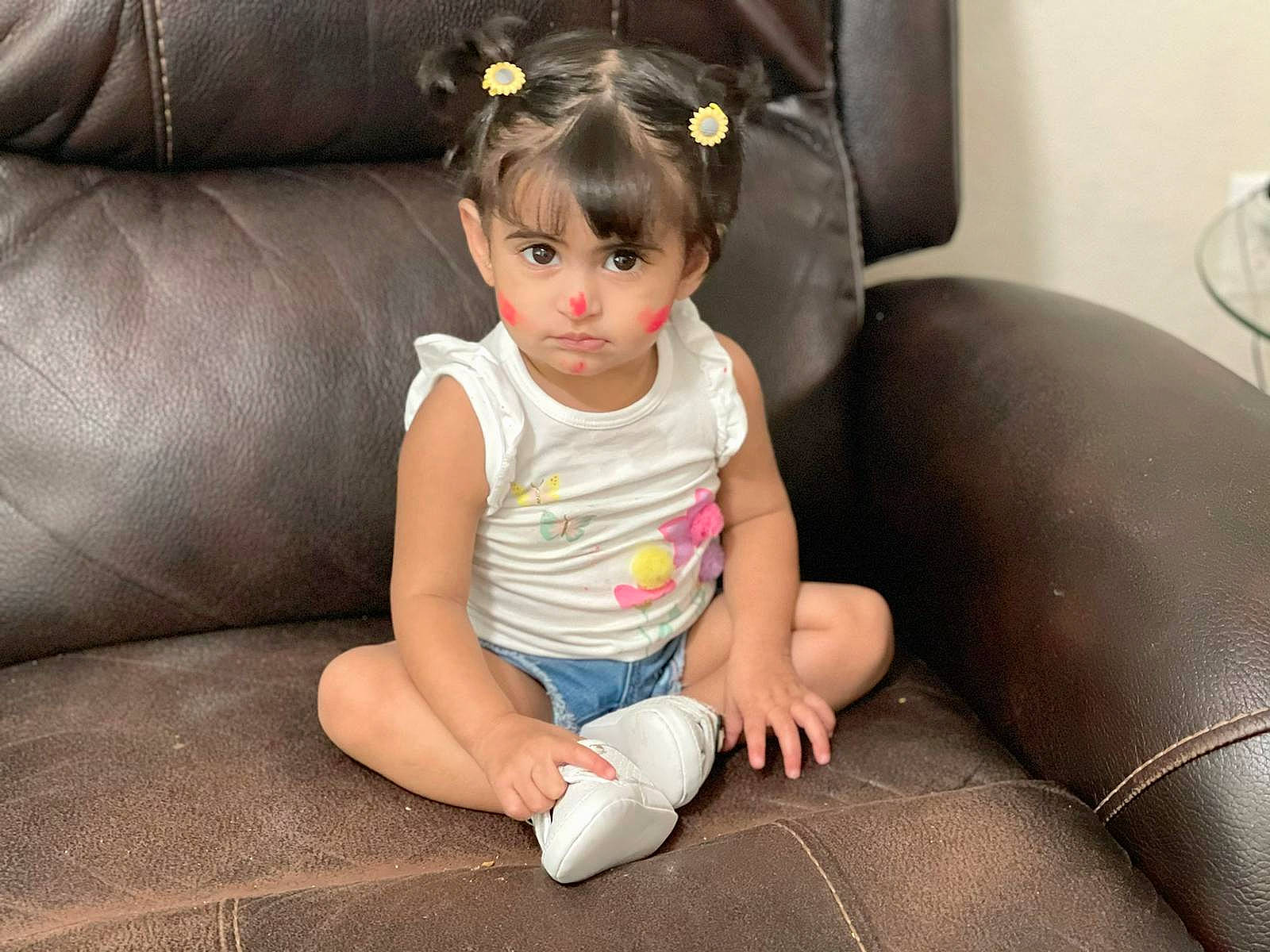 Jacey is registered to the contest to win money with this photo: baby, baby_toddler_clothing, barefoot, cheek, comfort, eye, flash_photography, floor, flooring, foot, head, human_body, human_leg, knee, lap, leg, neck, person, skin, thigh