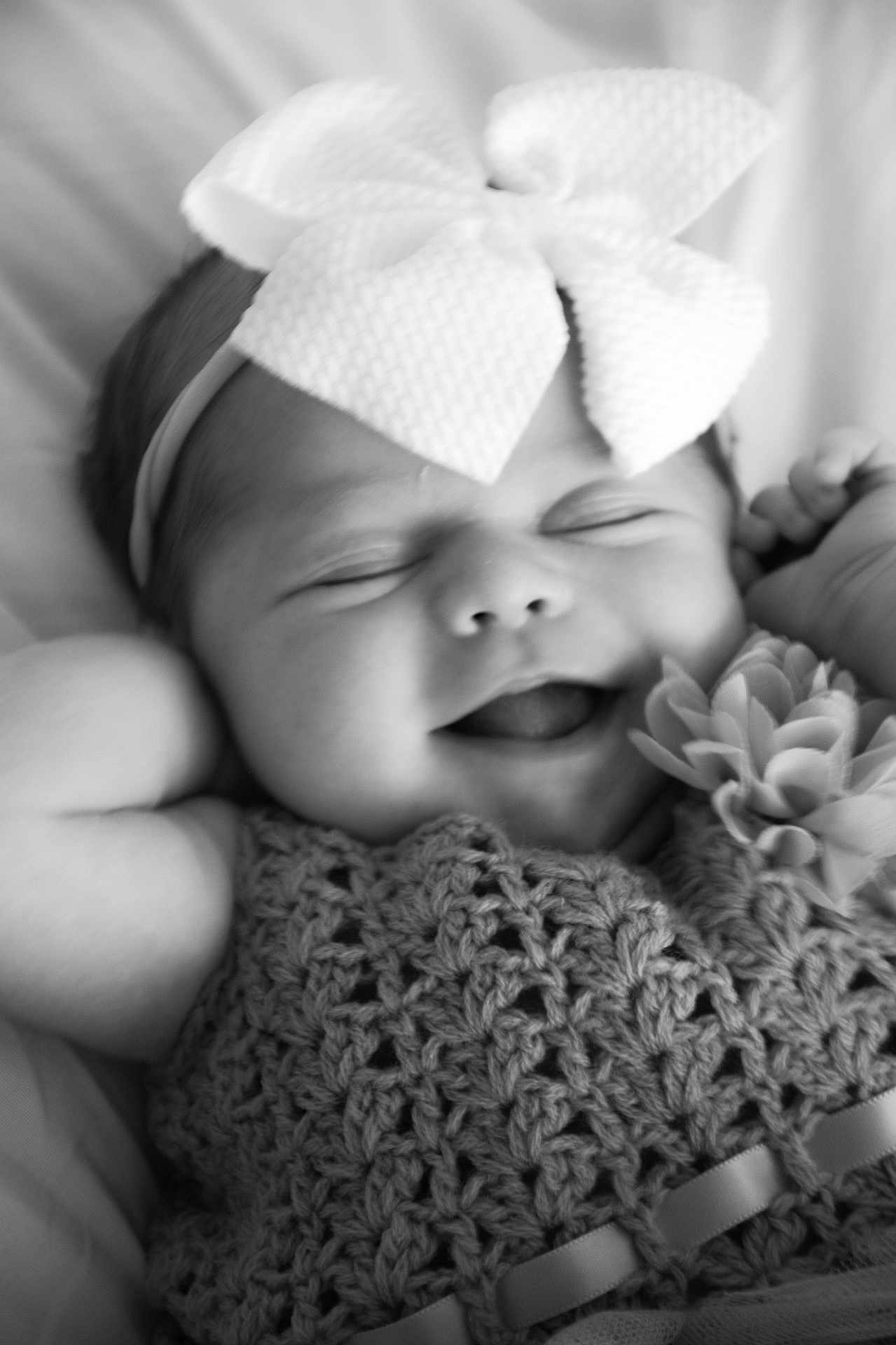 Paisley joined the competition — help win amazing prizes! baby, infant, smiling, black_and_white, headband, bow, crochet, flower, closeup, cute, peaceful, sleepy, portrait, child, happy, soft, texture, handmade, clothing, adorable