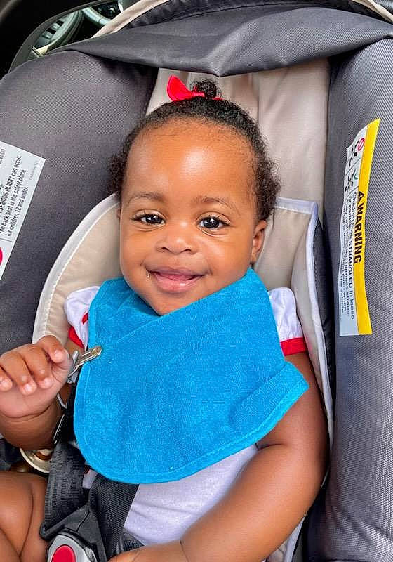 Scarlett joined the competition — help win amazing prizes! baby, baby_carriage, baby_products, baby_toddler_clothing, car_seat, cheek, child, comfort, electric_blue, fashion_accessory, fun, gesture, happy, joy, person, product, red, seat_belt, skin, smile