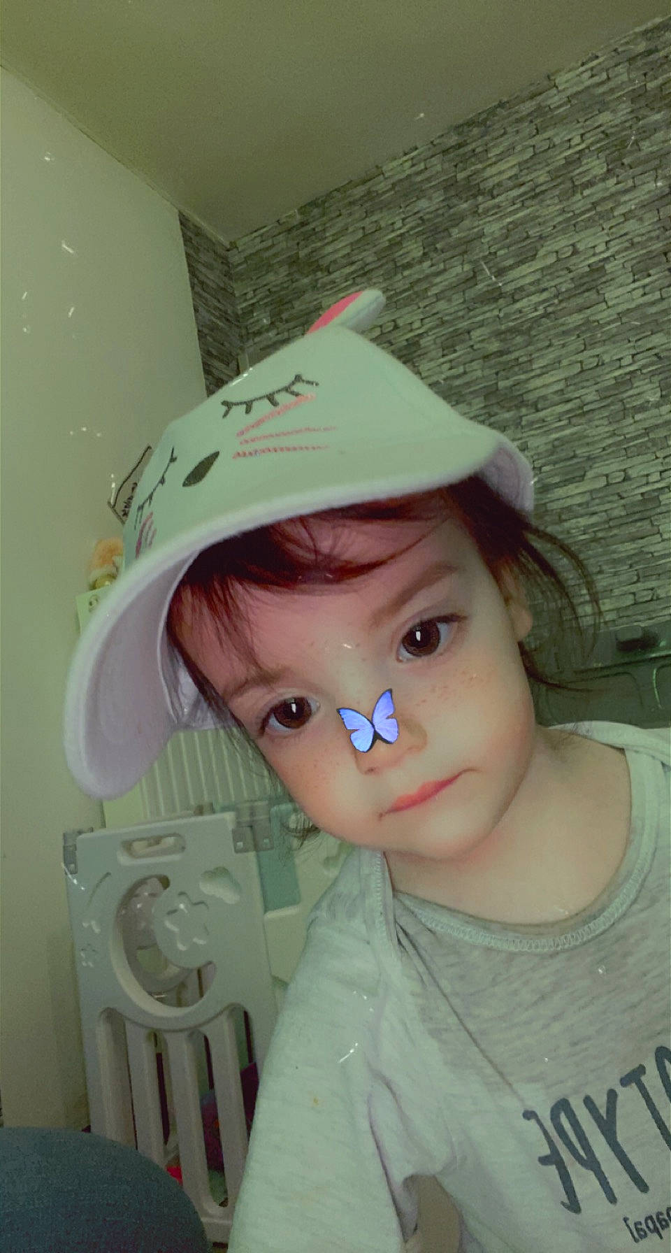 Alina participe au concours pour gagner de l'argent avec cette photo : bangs, baseball_cap, blond, brown_hair, cap, cheek, chin, clothing, doll, eye, eyebrow, eyelash, fashion_accessory, hat, headgear, lip, person, pink, skin, toy