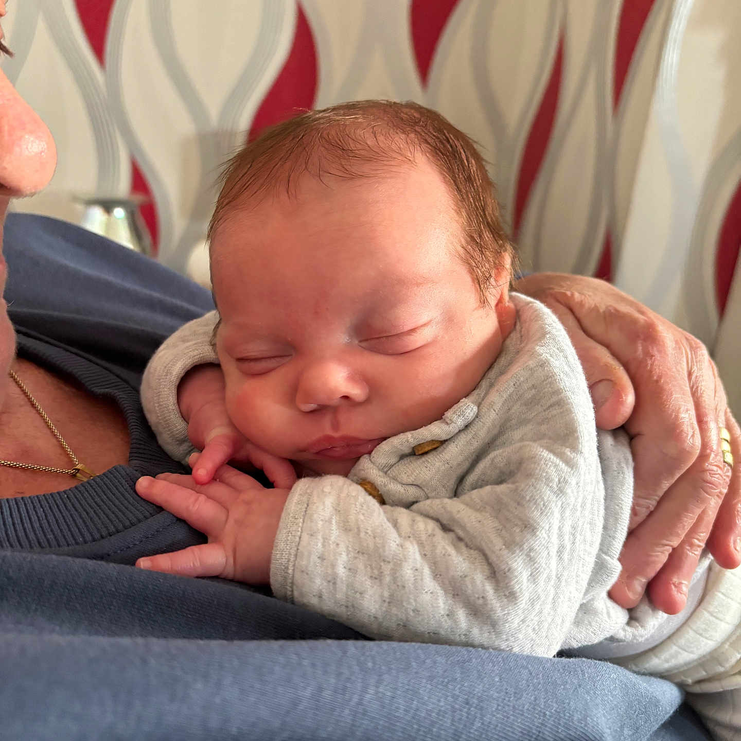 Aston-Lyndon is registered to the contest to win money with this photo: accessories, baby, blanket, bodypart, clothing, face, finger, hand, head, jewelry, knitwear, necklace, newborn, person, photography, portrait, quilt, sleeping, sweater, towel