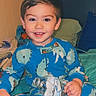 John joined the competition — help win amazing prizes! bed, boy, casual, child, colorful, comfort, cute, dinosaur_pattern, fun, happy, home, indoor, pajamas, person, plastic_bottle, playtime, smiling, toddler, toy, young_child