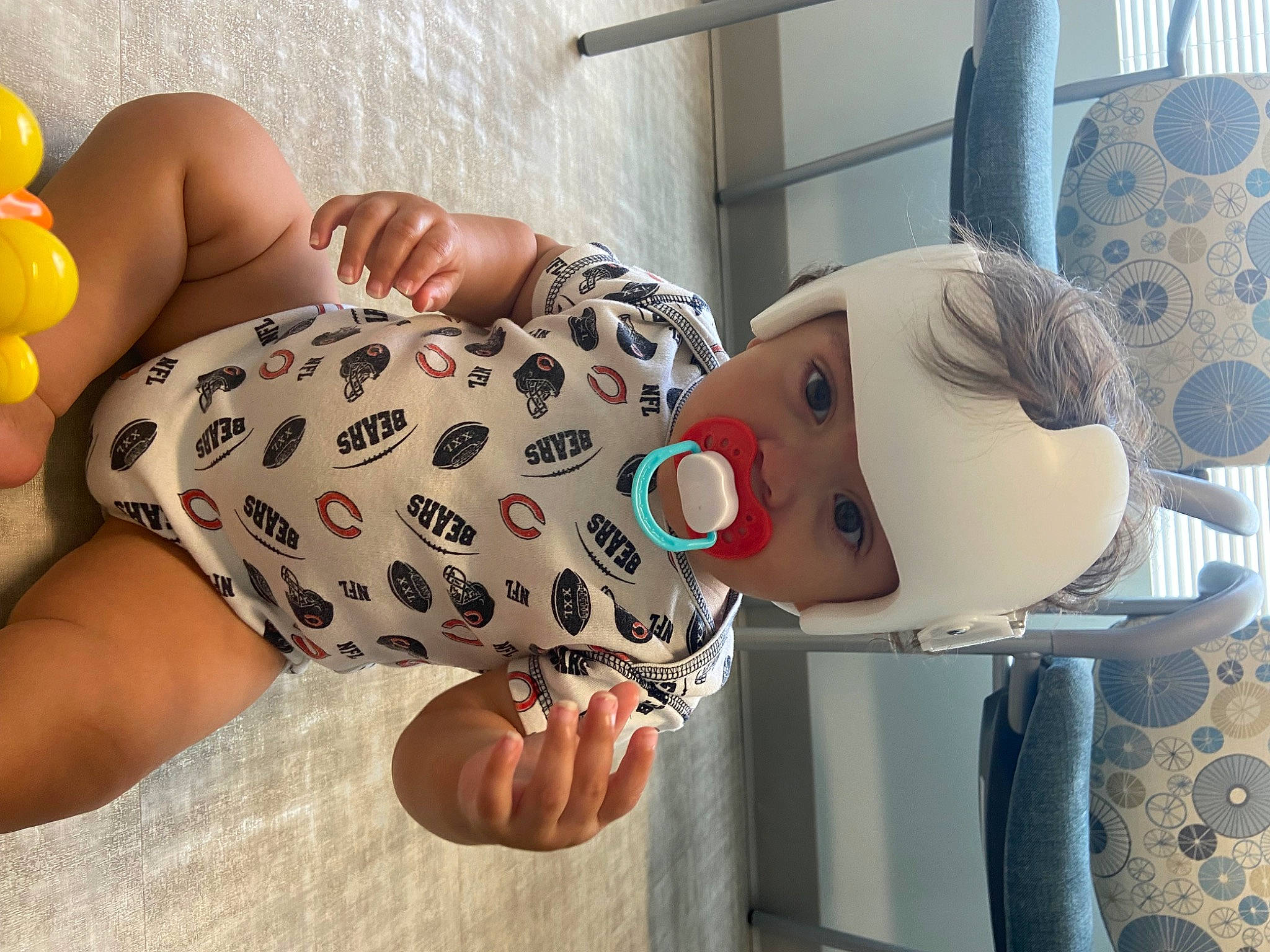 Reece joined the competition — help win amazing prizes! baby, baby_toddler_clothing, child, comfort, eyewear, finger, foot, happy, headwear, human_leg, joint, nail, organ, person, product, skin, textile, thigh, thumb, toddler