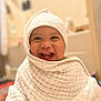 Karmelo is registered to the contest to win money with this photo: baby, smile, towel, wrapped, happy, indoor, child, cute, texture, face, head, infant, expression, warm, cozy, person, newborn, soft, blanket, portrait
