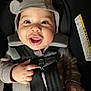 Karmelo is registered to the contest to win money with this photo: baby, child, car_seat, safety_harness, smiling, happy, knit_hat, cute, infant, portrait, clothing, seatbelt, hand, face, child_safety, indoor, closeup, young_child, person, adorable
