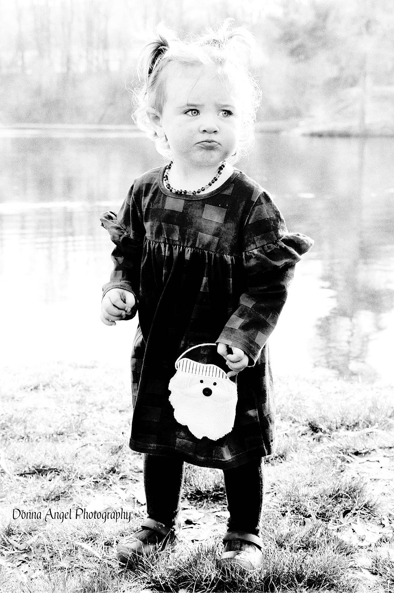 Madilyn joined the competition — help win amazing prizes! ball, black_and_white, face, flash_photography, grass, happy, headgear, monochrome, monochrome_photography, people_in_nature, person, personal_protective_equipment, photograph, plant, snapshot, sports_equipment, standing, street_fashion, style, toddler