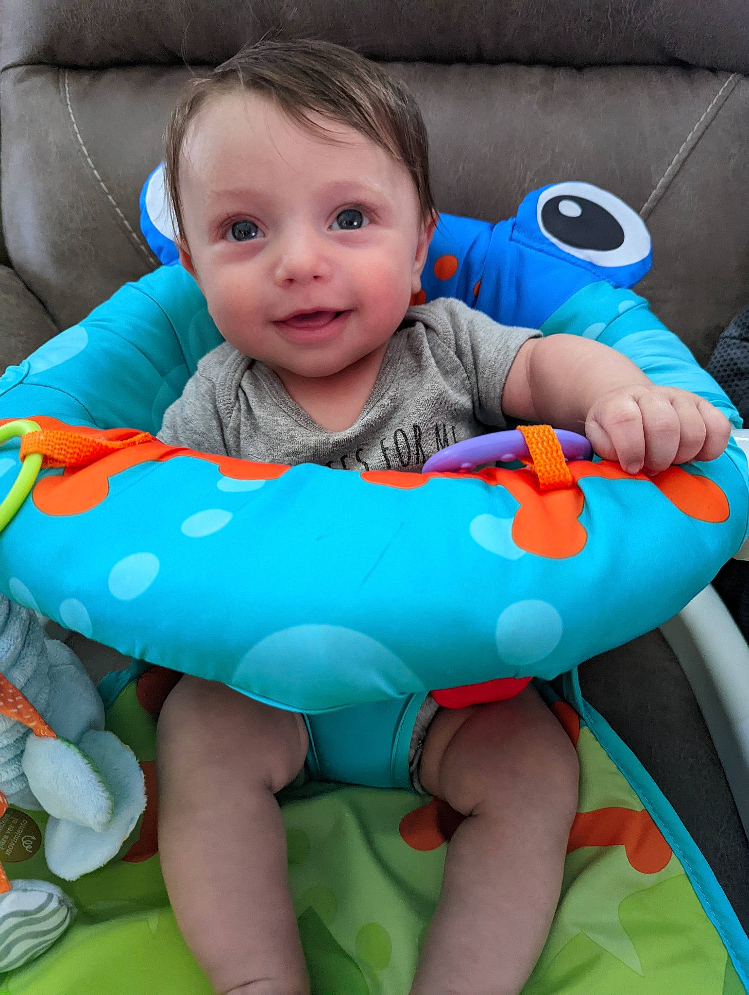 Skylar is registered to the contest to win money with this photo: arm, azure, baby, baby_toddler_clothing, blue, cheek, child, comfort, face, finger, fun, hand, happy, head, human_body, joy, lap, leg, person, skin