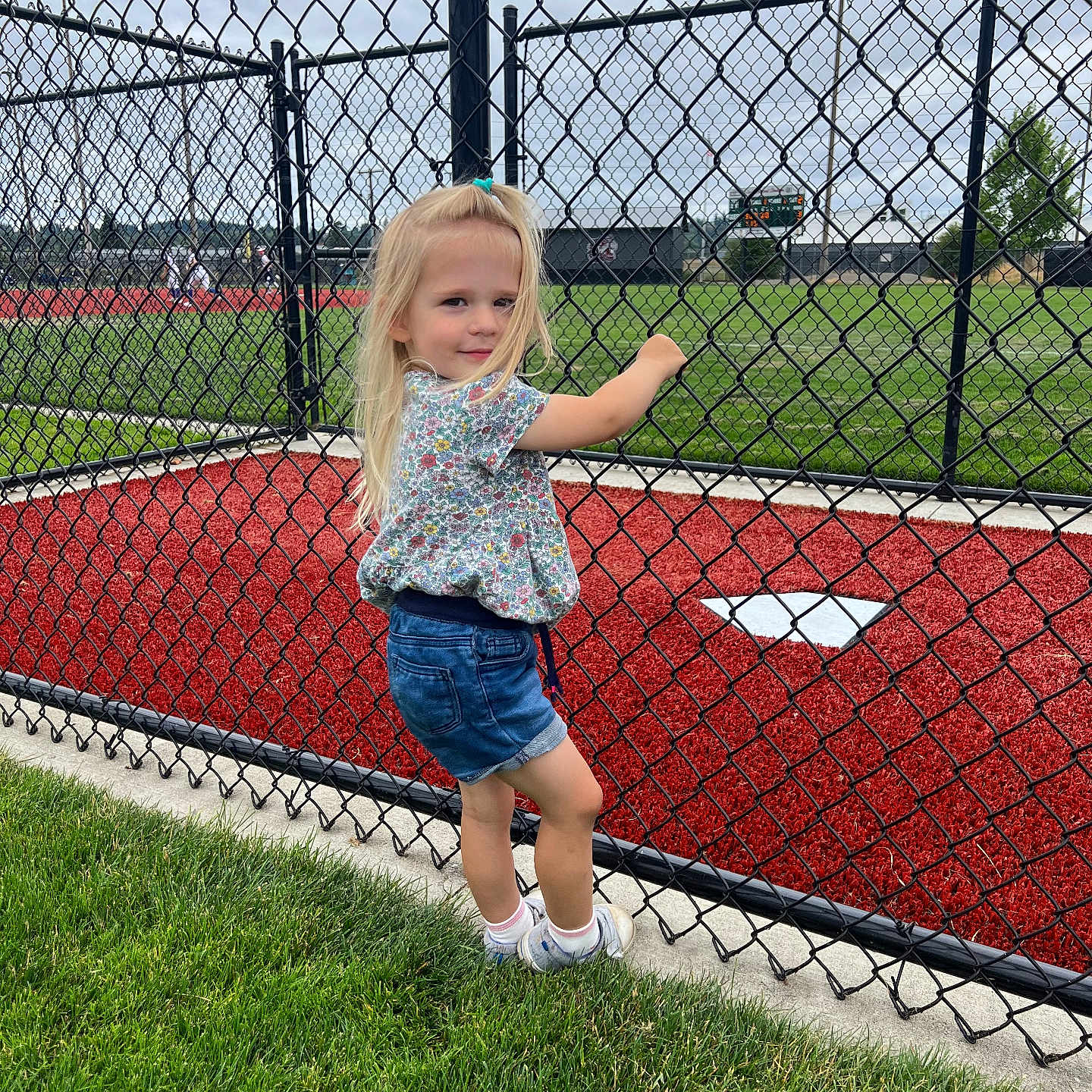 Aspen joined the competition — help win amazing prizes! backyard, child, clothing, face, female, fence, field, girl, grass, head, jeans, nature, outdoors, pants, person, photography, plant, portrait, shorts, yard
