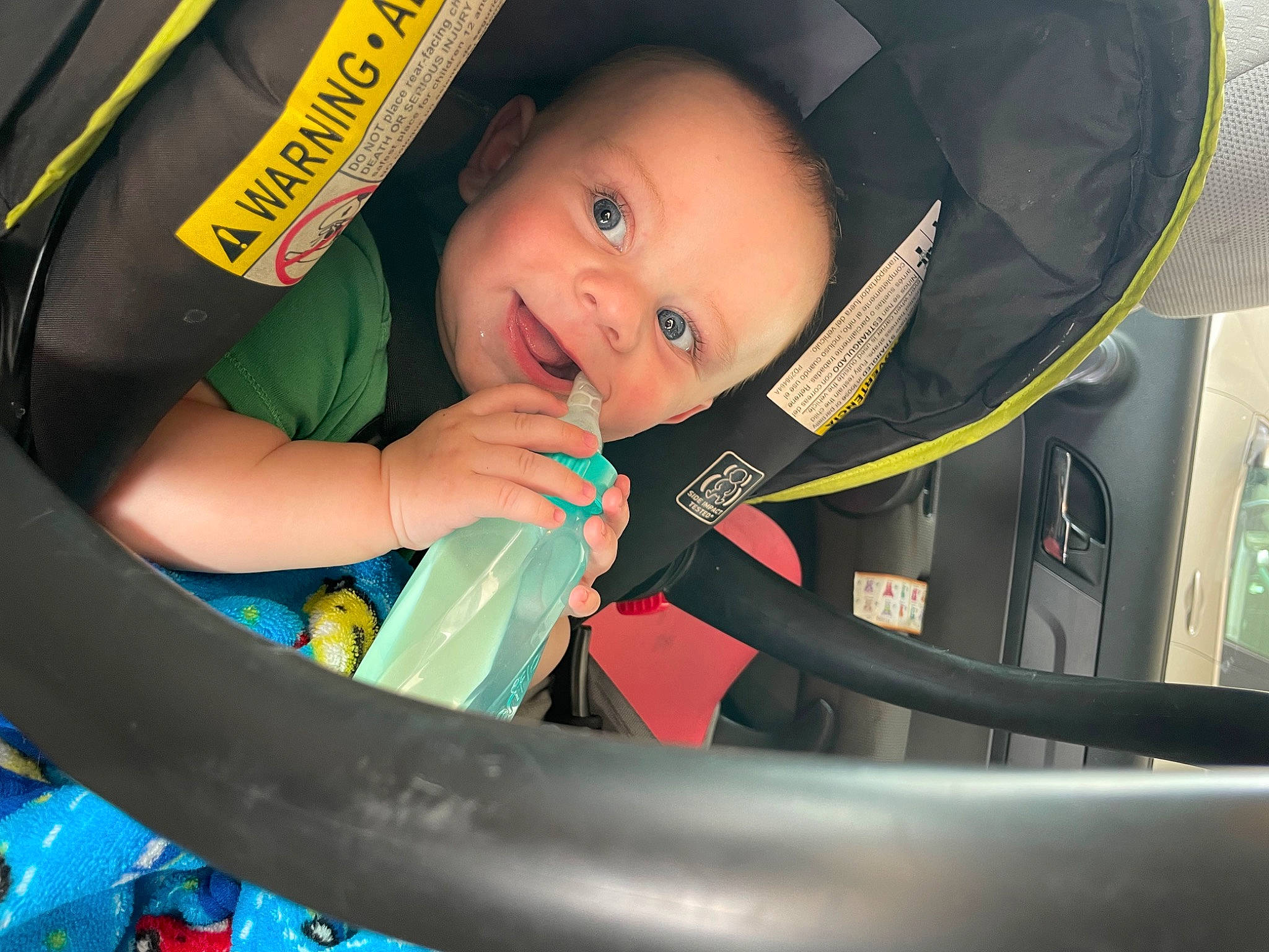 Connor Wayne Ulmer joined the competition — help win amazing prizes! auto_part, automotive_design, automotive_lighting, baby, baby_carriage, car_seat, child, electric_blue, eye, fun, happy, motor_vehicle, person, personal_protective_equipment, product, smile, steering_wheel, toddler, vehicle_door, windshield