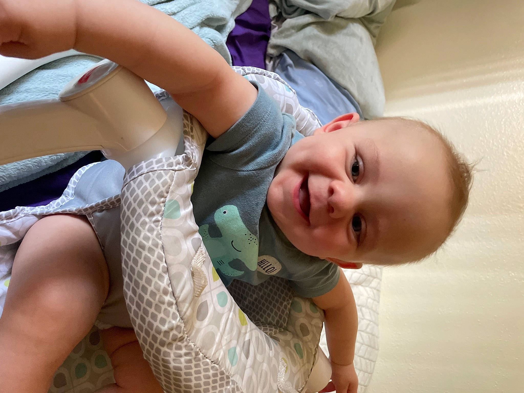 Connor Wayne Ulmer is registered to the contest to win money with this photo: baby, baby_toddler_clothing, child, comfort, elbow, eye, finger, fun, grass, hairstyle, happy, head, human_body, joint, joy, knee, mouth, person, skin, smile