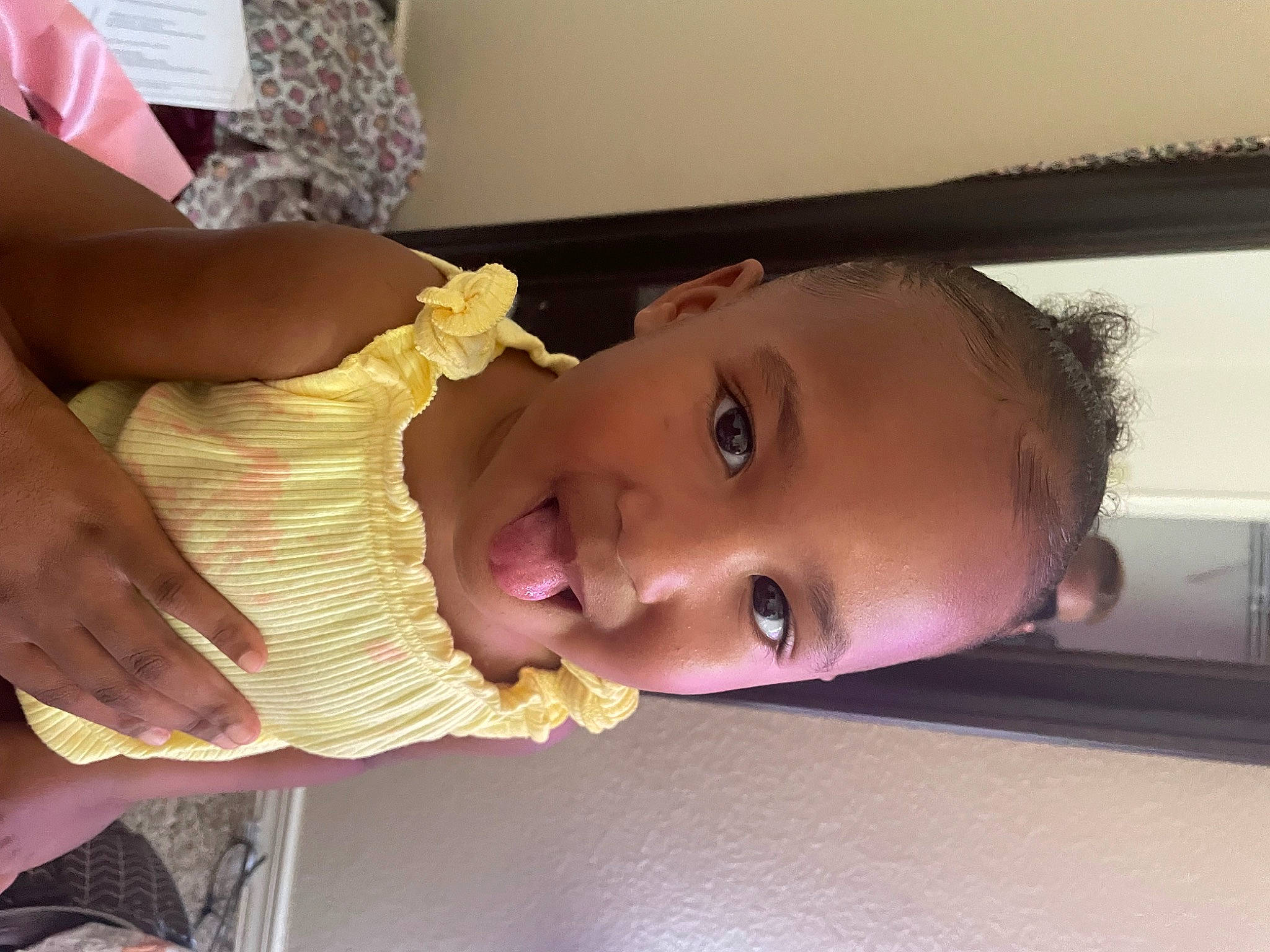 Amani is registered to the contest to win money with this photo: baby, baby_products, cheek, child, dress, eyelash, finger, food, fun, happy, joy, lip, mouth, neck, nose, person, skin, smile, toddler, vehicle_door
