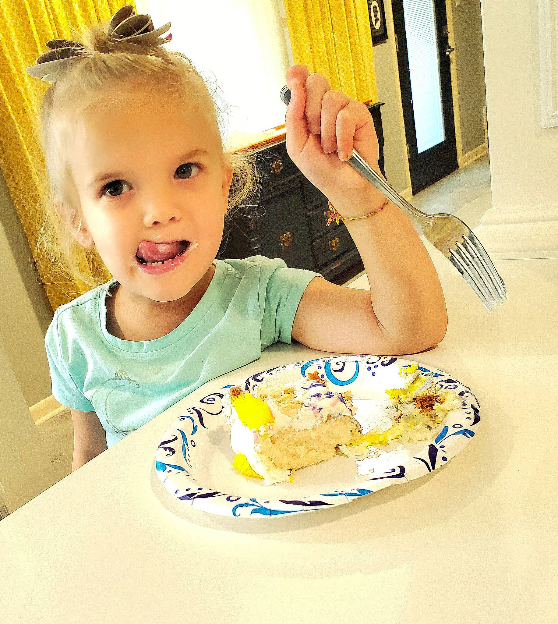 Madlynn joined the competition — help win amazing prizes! cake, chair, child, cooking, cuisine, desk, dishware, drinkware, food, happy, person, plate, platter, recipe, serveware, sharing, smile, t_shirt, table, tableware