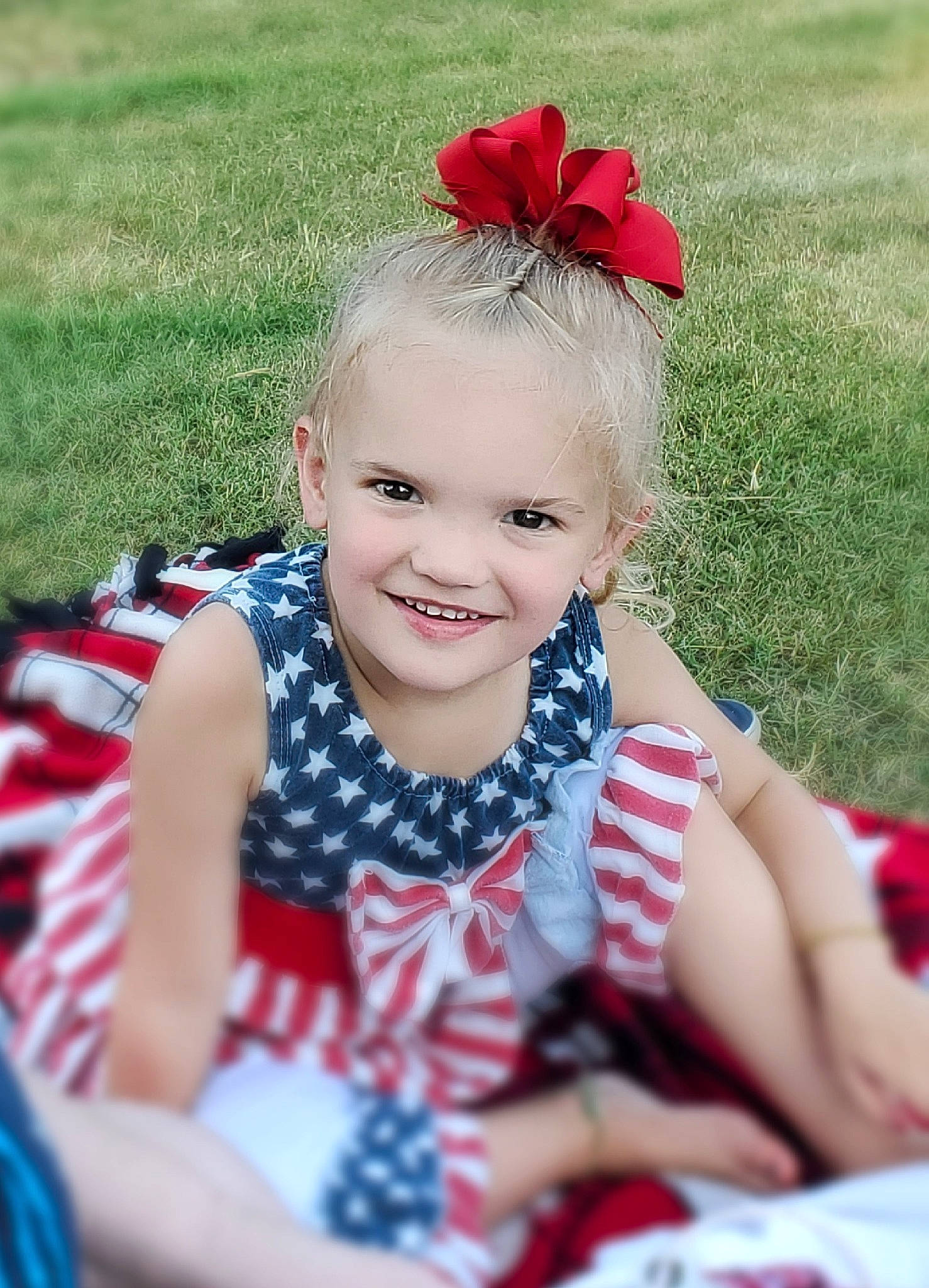 Madlynn is registered to the contest to win money with this photo: baby_toddler_clothing, beauty, child, dress, eye, face, facial_expression, fun, grass, happy, headband, joy, lip, pattern, people_in_nature, person, pink, plant, red, skin