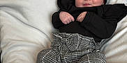 Sienna joined the competition — help win amazing prizes! baby, sleeping, infant, black_top, ruffles, checkered_pants, pink_shoes, headband, bow, blanket, soft, comfortable, resting, cute, child, fashion, portrait, indoors, cozy, clothing