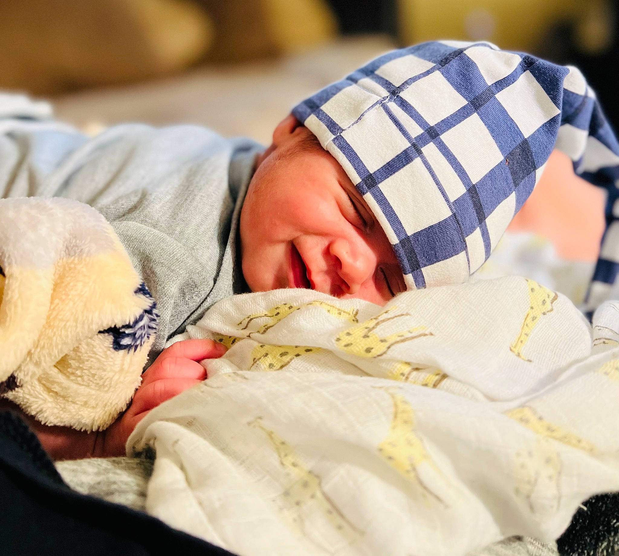 Apollo joined the competition — help win amazing prizes! baby, baby_sleeping, baby_toddler_clothing, bedtime, blanket, child, comfort, event, hat, headwear, linens, nap, pattern, person, plaid, room, sleep, sleeve, tartan, toddler