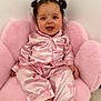 Taslim a rejoint le concours — aidez-le/la à gagner de superbes lots ! baby, child, pajamas, pink, chair, smile, happy, cute, indoor, pigtails, hair, feet, sitting, face, person, soft, plush, cozy, clothing, portrait