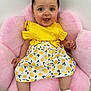 Taslim participe au concours pour gagner de l'argent avec cette photo : baby, child, smiling, yellow_clothing, dress, patterned_skirt, sandals, pink_chair, fluffy_chair, happy, cute, portrait, sitting, indoor, person, young_child, hair_buns, accessories, footwear, bright_colors