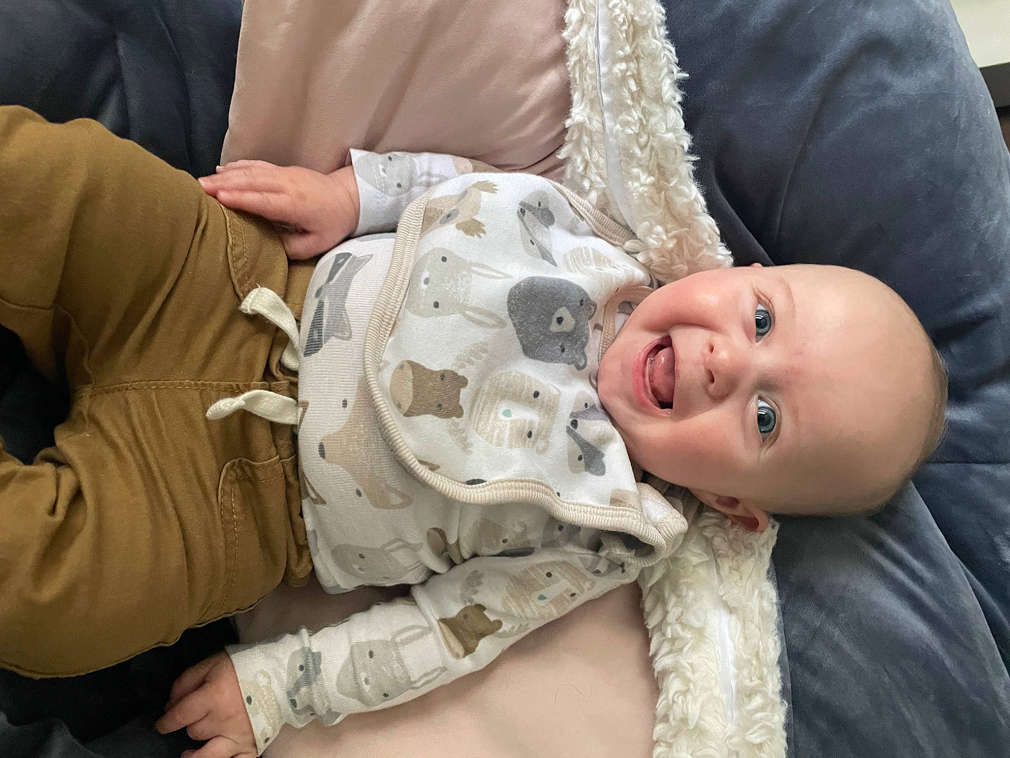 Arrow joined the competition — help win amazing prizes! baby, child, comfort, couch, facial_expression, fun, fur, gesture, grass, happy, interaction, laugh, mouth, pattern, person, sitting, skin, sleeve, smile, toddler