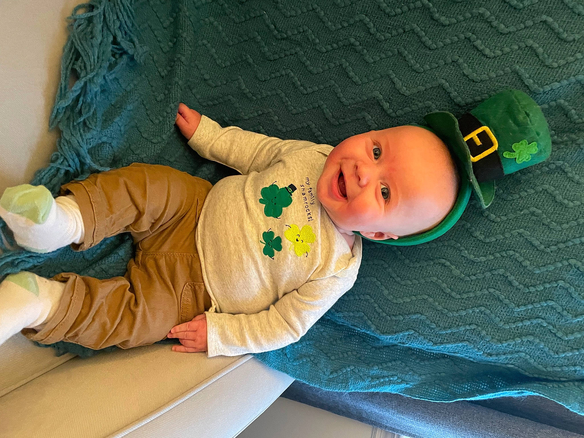 Arrow joined the competition — help win amazing prizes! baby, baby_products, baby_safety, baby_sleeping, baby_toddler_clothing, baby_toys, child, comfort, finger, hat, linens, person, product, room, sitting, skin, sleeve, smile, sock, textile