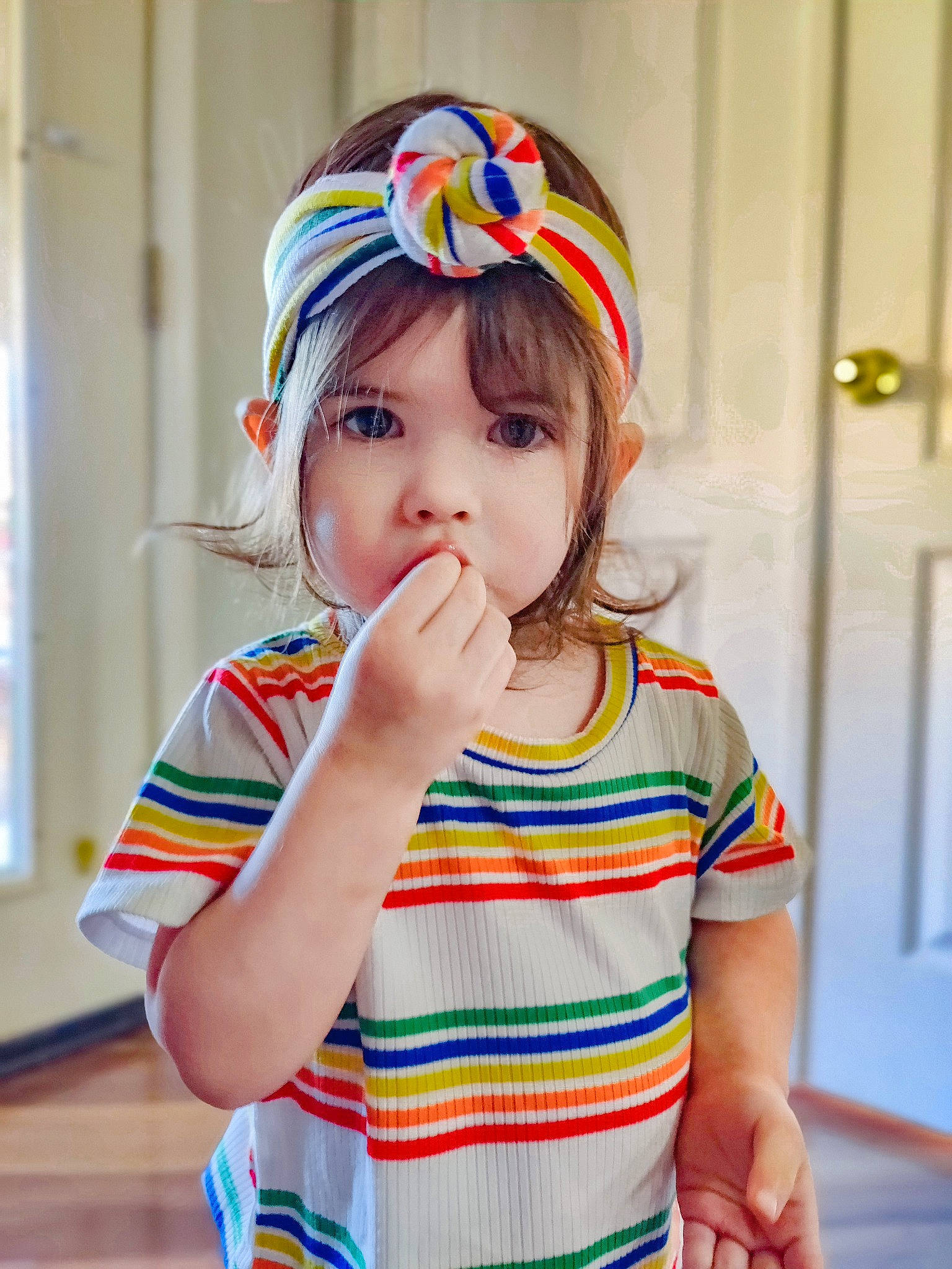Quinn joined the competition — help win amazing prizes! baby_toddler_clothing, cap, child, clothing, eye, eyelash, face, facial_expression, fun, hair_accessory, hairstyle, happy, headband, headpiece, neck, outerwear, pattern, person, skin, sleeve