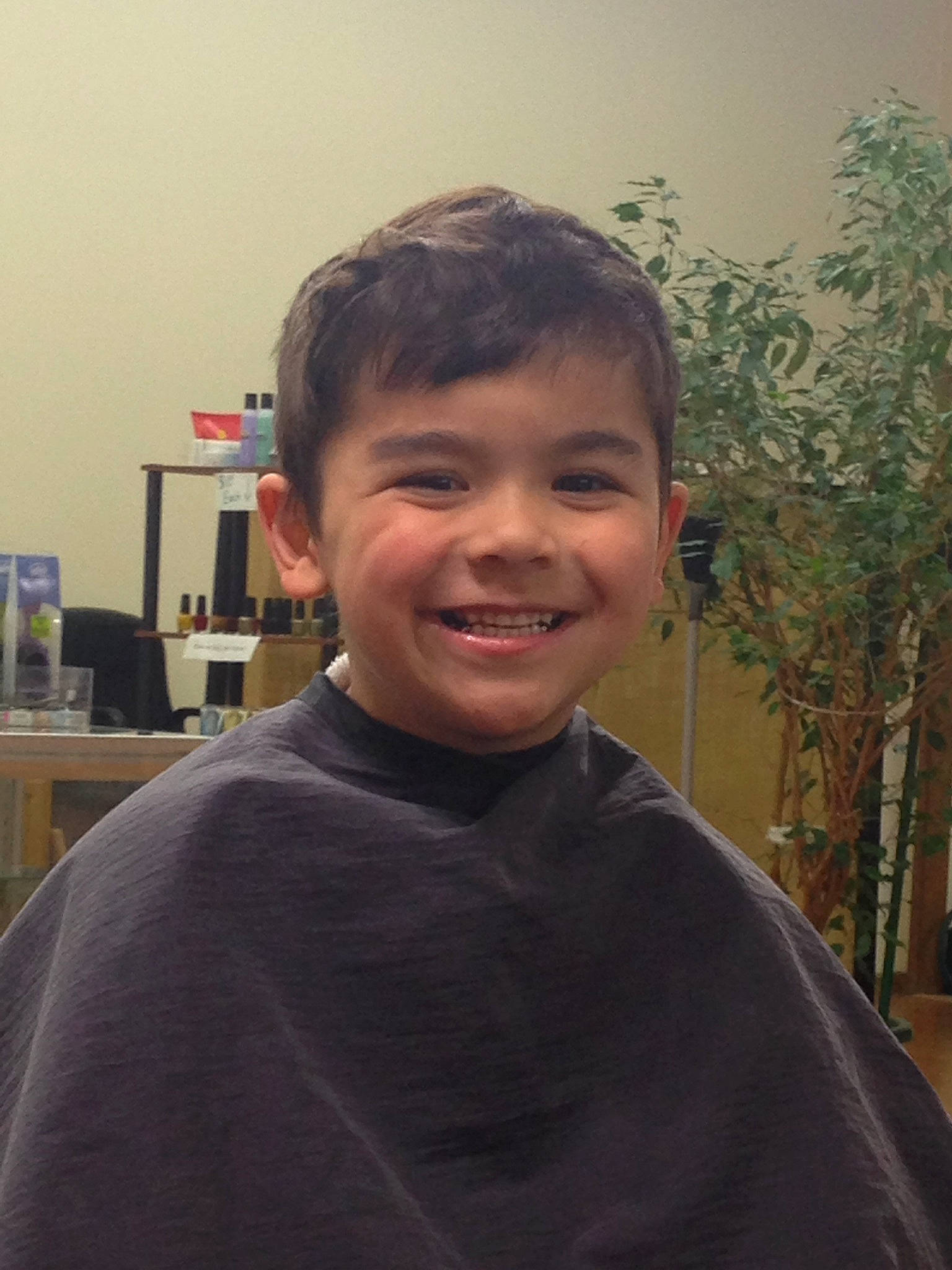 Joshua is registered to the contest to win money with this photo: cheek, child, chin, ear, eye, eyebrow, forehead, fun, happy, jaw, joy, laugh, neck, nose, person, shoulder, sitting, sleeve, smile, t_shirt