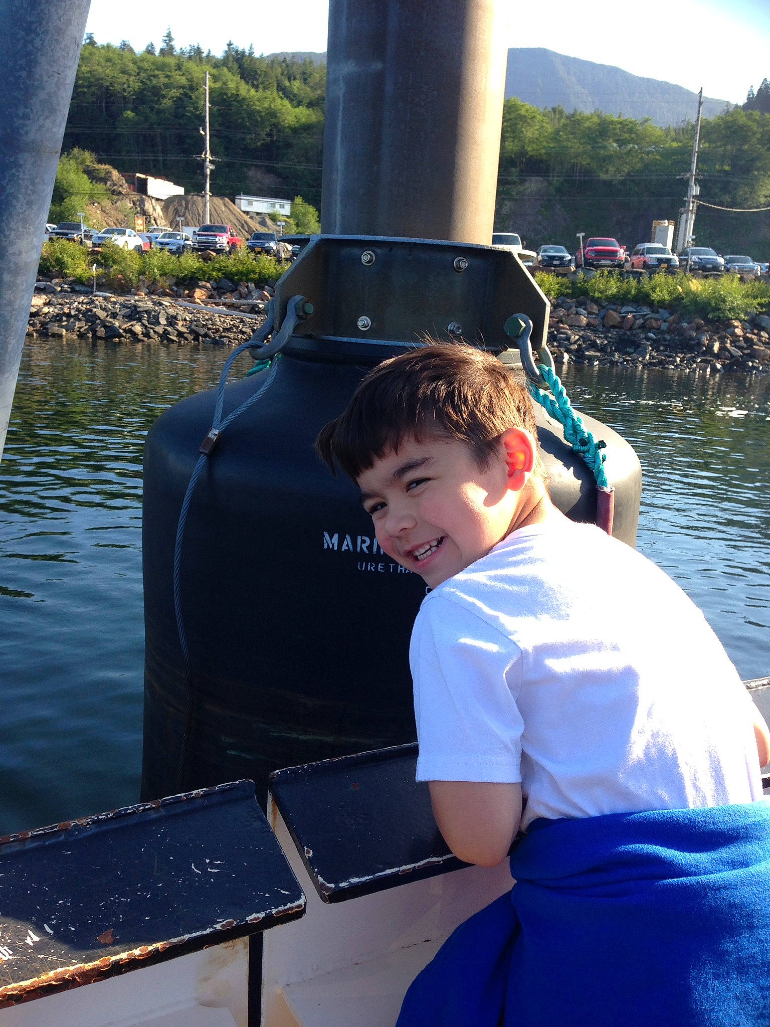 Joshua joined the competition — help win amazing prizes! boats_and_boating_equipment_and_supplies, canal, electric_blue, eyewear, fun, joy, lake, leisure, naval_architecture, person, recreation, sky, summer, t_shirt, tourism, travel, tree, vacation, water, water_transportation