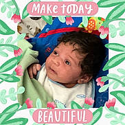 Isabella is registered to the contest to win money with this photo: baby, infant, blanket, face, curly_hair, blue_clothing, green_blanket, floral_frame, pink_banners, text_overlay, looking_up, cute, portrait, indoors, child, young, person, expression, soft_lighting, colorful